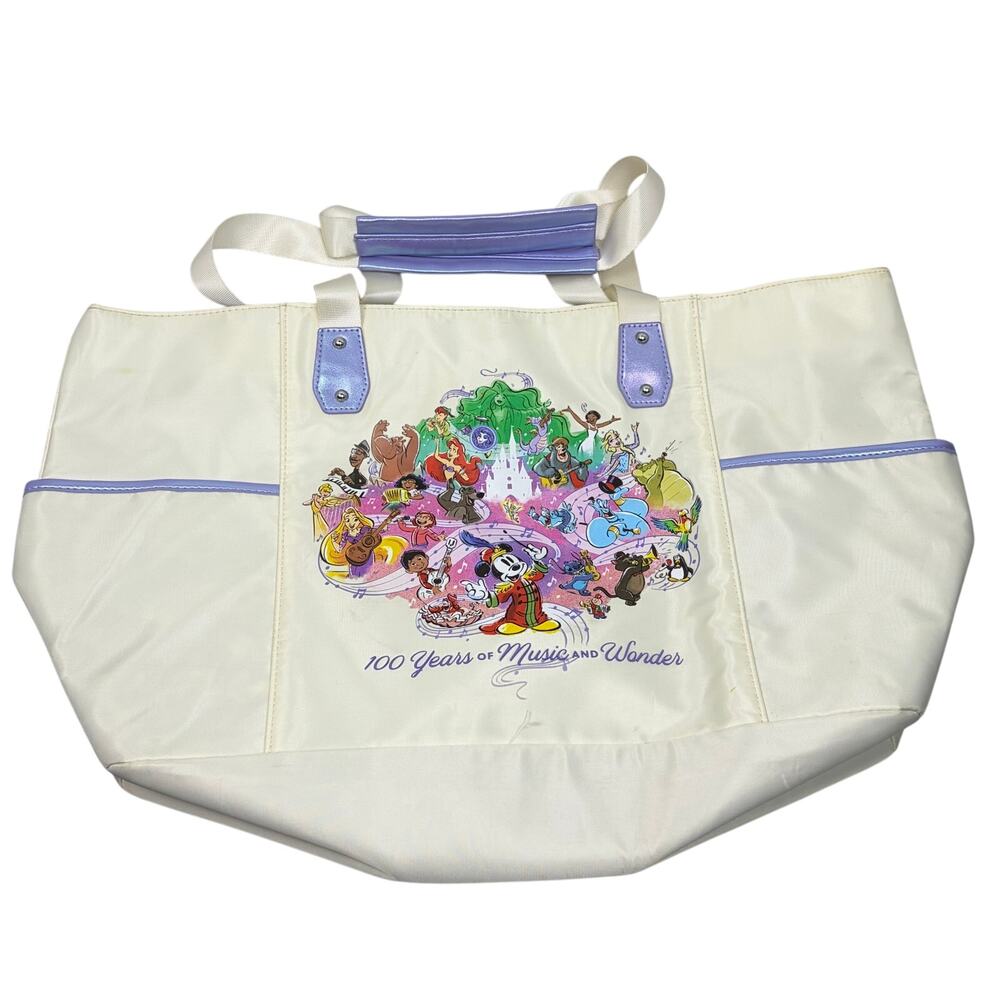 Disney 100 yrs of Music & Wonder tote bag. cream, shimmer purple. Never used